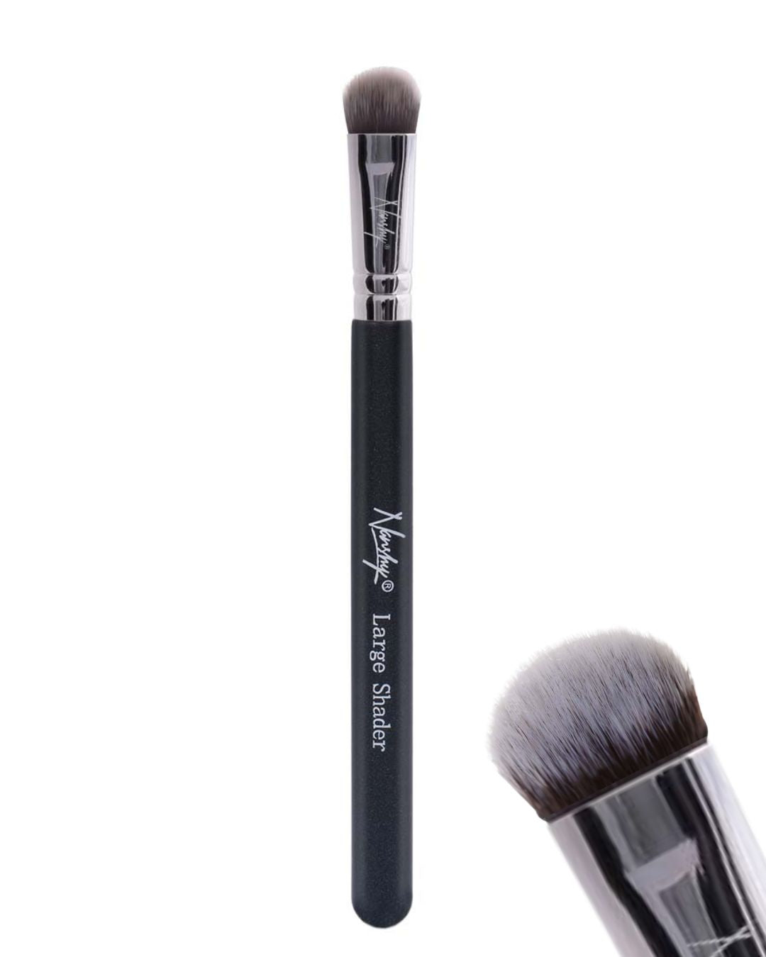 Large shader brush with soft, vegan bristles and a sleek, pearl-coated handle. Perfect for blending and shading eyeshadow.