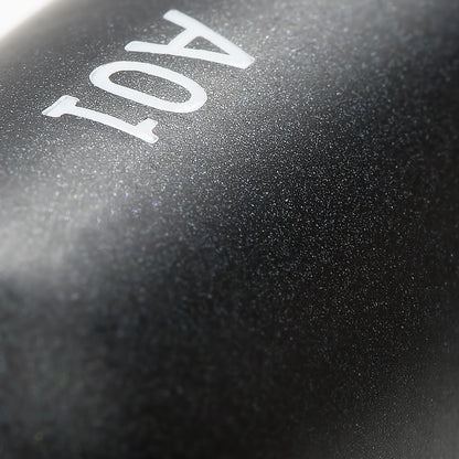 Close-up of the Large Shader makeup brush with a pearl-coated handle and the number "401" printed on it.